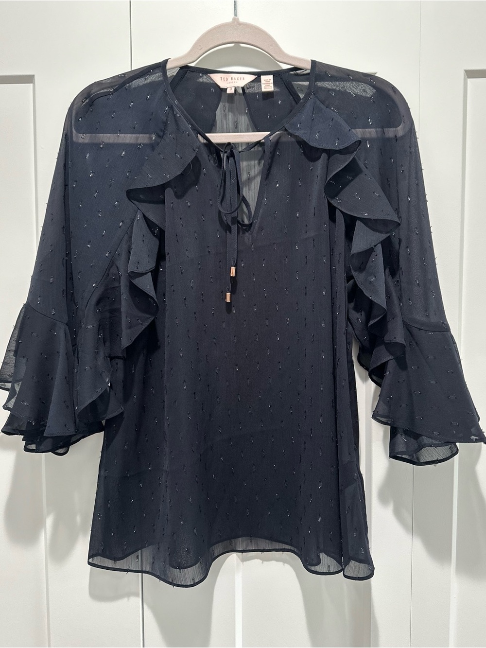 Ted Baker London Navy Ruffle Tie-Neck Sheer Blouse with long sleeves.